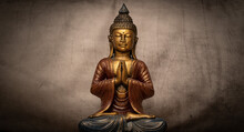 Golden Buddha On Grey Vintage Background