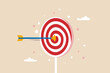 Aiming for children education target, parenting or kid knowledge or skill, humor business target or achievement concept, bow arrow children toy with suction cup hit sweet lollypop bullseye target.
