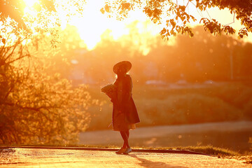 Wall Mural - happy romantic girl in a straw hat / young model in a dress summer day, happiness woman