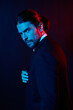 © SHOTPRIME STUDIO - portrait of a man in costume posing fashion neon light