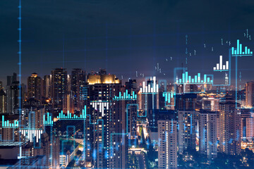 Stock market graph hologram, night panorama city view of Kuala Lumpur. KL is popular location to gain financial education in Malaysia, Asia. The concept of international research. Double exposure.