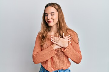 Sticker - Young blonde woman wearing casual clothes smiling with hands on chest, eyes closed with grateful gesture on face. health concept.