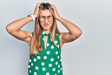 Sticker - Beautiful hispanic woman wearing elegant shirt and glasses suffering from headache desperate and stressed because pain and migraine. hands on head.