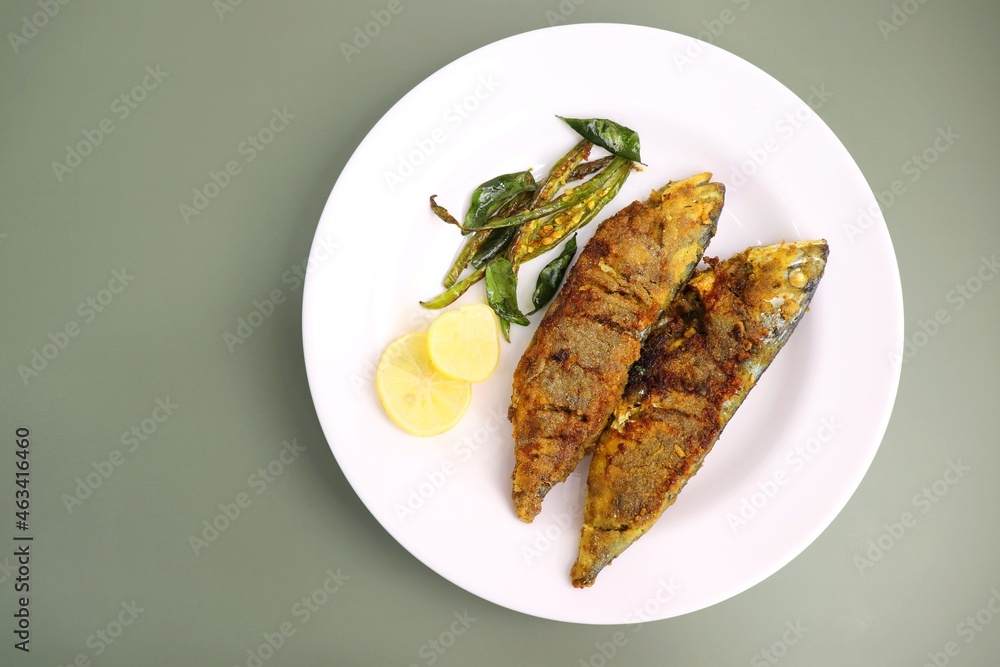 Indian Mackerel fish fry. Bangda Rava fry. whole Fried fish served on a ...