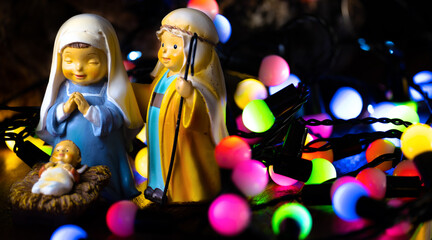 Closeup shot of figures of Saint Joseph, Virgin Mary, and baby Jesus - Christmas concept