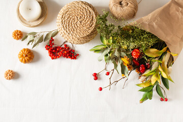 Wall Mural - Handmade autumn bouquet with dry plants, grass