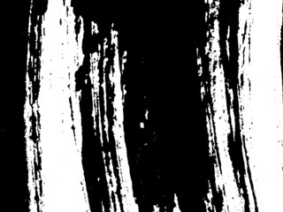 Grunge is black and white. Texture of black strokes on a white background. Abstract chaotic movements with a dry brush. Monochrome pattern of worn surface