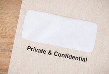 Private And Confidential Business Envelope On Desk, UK