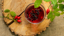 Antioxidant Mug With Rustic Red Rosehip Tea. Herbal Tincture Red Tea, Red Berry Homopathy