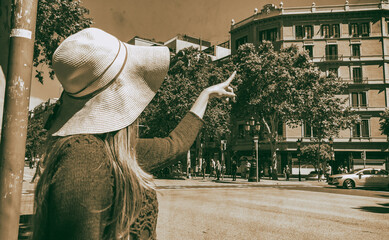 Sticker - Happy woman with straw hat visiting city in spring