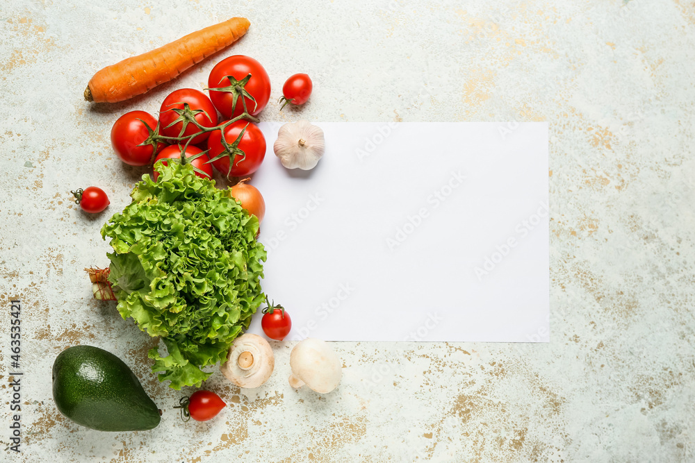 Healthy products and blank sheet of paper on light background