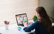 © vectorfusionart - Caucasian girl using laptop for video call, with smiling diverse high school pupils on screen