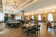© rilueda - Interior of a modern hotel restaurant