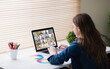 © vectorfusionart - Caucasian girl using laptop for video call, with smiling diverse elementary school pupils on screen