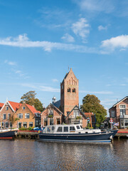 Wall Mural - Boats, houses and church tower in town of Grou, Friesland, Netherlands