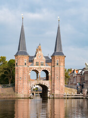 Wall Mural - Waterpoort, water gate, and Kolk canal in city of Snits, Sneek in Friesland, Netherlands