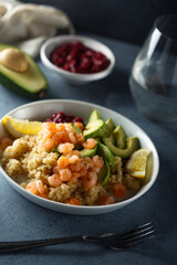 Wall Mural - Healthy quinoa bowl with shrimps and avocado