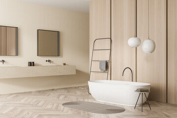 Corner of beige bathroom with square mirrors