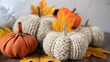 © Елена Смыкова - Hand made fabric pumpkin over grey knitted blanket for fall home decoration