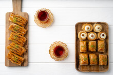 Top View Of Turkish Desserts On Wooden Background