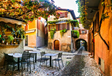 Charming Old Narrown Streets Of Italian Villages. Malcesine, Garda Lake, Italy. Autumn Colors, Cosy Street Bars