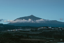 View At The Pico Del Teide From The North Coastline Of The Tenerife, Top Of The Volcano Hide In The Cloud Liten By The Morning Sun