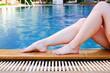 © u photostock - closeup body of woman in poolside, happy life on summer season