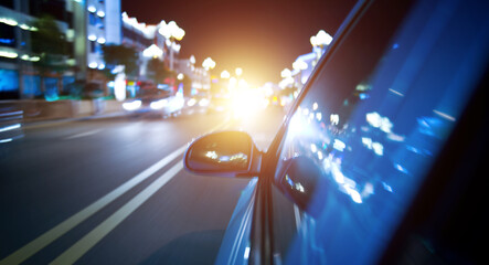 Wall Mural - night drive ,shoot from the window of speed car, motion blur steet light.