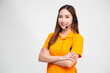 © comzeal - Portrait of happy smiling asian woman telemarketing operator in orange delivery uniform with headphone isolated on white background, Call center or Customer service concept