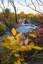 The Hog's Back Falls And Bridge, Prince Of Wales Falls Waterfalls On The Rideau River In Ottawa In Autumn Season. Colorful Nature In Park With River