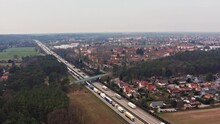 An Aerial View Of A Traffic Jam Caused By Trucks On A German Motorway.