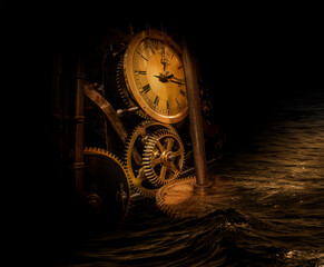 The mechanism of an old antique watch submerged in water. River of time. Philosophy image of time transience.