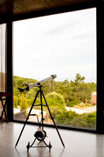 Huge Window On The Countryside View And Telescope