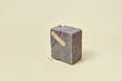 © Yaroslav Danylchenko/Stocksy - Broken stone with adhesive plaster