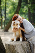 © Oleksii Syrotkin/Stocksy - Female owner embracing animal