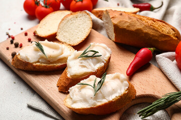 Wall Mural - Pieces of bread with lard spread on white background