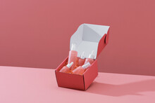 Set Of Cosmetics In A Square Red Box