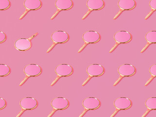 Trendy pink pattern made of golden mirrors, with one different position. Pink background. Minimal con