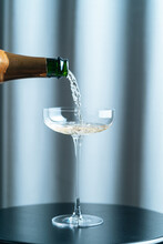 Champagne Being Pouring Into Glass