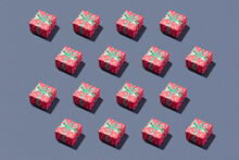 Red Gift Boxes On Trendy Vibrant Green Background