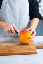 Chef Cutting Mango