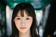 © Heng Yu/Stocksy - Portrait of a young Asian woman