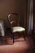 © Marcos Osorio/Stocksy - Chair next to the light of the window