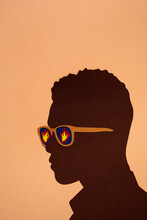 Black Man With Glasses Reflecting Fire