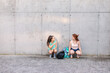 © ByLorena/Stocksy - Young students talking in university campus