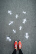 © plpictures by Paedii Luchs/Stocksy - Paved road with paper arrows
