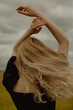 © Brianna Lee/Stocksy - Young woman dancing