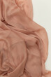 © Melika Tursic/Stocksy - Rose gold scarf