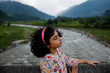 © Saptak Ganguly/Stocksy - Young girl with closed eyes contemplates in nature