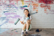 Portrait Of Happy Girl With Graffiti